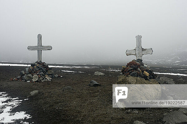 Two makeshift graves on Deception Island in Antarctica; Deception Island  Antarctica