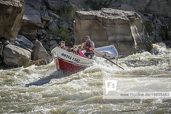 People in rowboat in Green river  Utah  USA