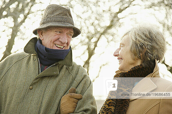 Mature couple looking at each other in a park