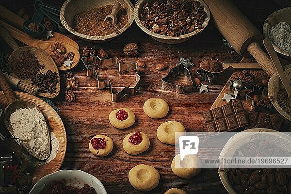 Hussarenkrapferl are filled with jam  baking ingredients  flour  sugar  almonds  nuts  chocolate  cinnamon  cookie cutters
