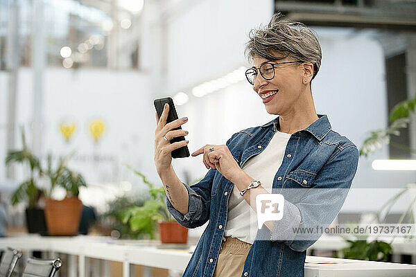 Female entrepreneur having a video call on smart phone