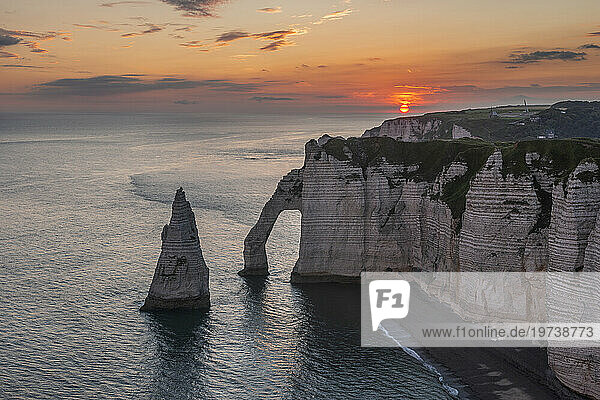 France  Normandy  Falaise dAval and Aiguille dEtretat rock formation at sunrise
