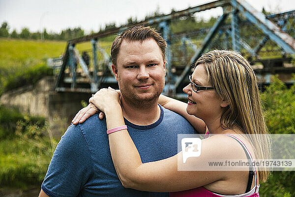 Close-up portrait of a couple while on a nature walk in a park; Edmonton  Alberta  Canada