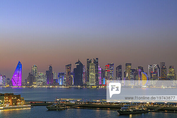 The skyline of the capital city of Doha and Business District at nightfall; Doha  Qatar