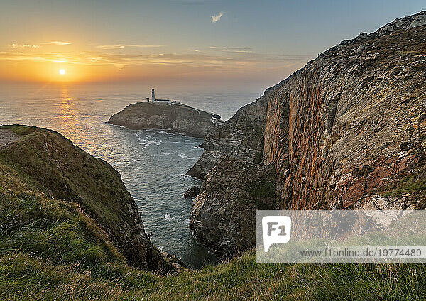 Cliffs and South Stack Lighthouse at sunset  Holy Island  Anglesey  Wales  United Kingdom  Europe