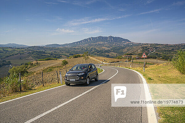 View of winding road near Torraccia and San Marino in background  San Marino  Italy  Europe