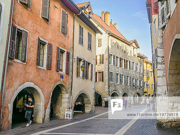 Medieval buildings with covered passages line streets in the old center of Annecy  Annecy  Haute-Savoie  France  Europe