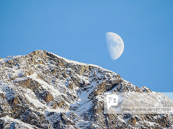 Moonrise behind Corvatsch peak, Switzerland, Europe