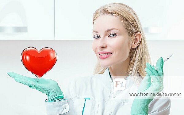 Porträt eines blonden Mädchens in einem Arztkittel. Sie hält ein rotes Herz in ihrer Handfläche. Konzept der Kardiologie und Transplantologie. Gemischte Medien