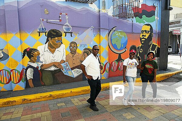 Guides in front of Marcus Garvey  Education-Mural  Water Lane  Downtown Arts Projekt  Kingston  Jamaica