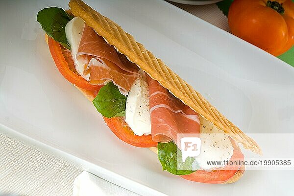 Panini Sandwich mit frischem Caprese und Parmaschinken  Food photography