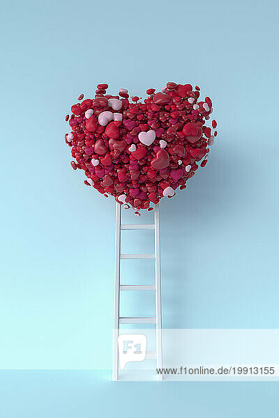 White ladder reaching to heart shaped balloon against blue background