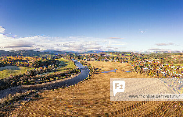 UK  Scotland  Aboyne  Aerial view of river Dee and vast field in autumn