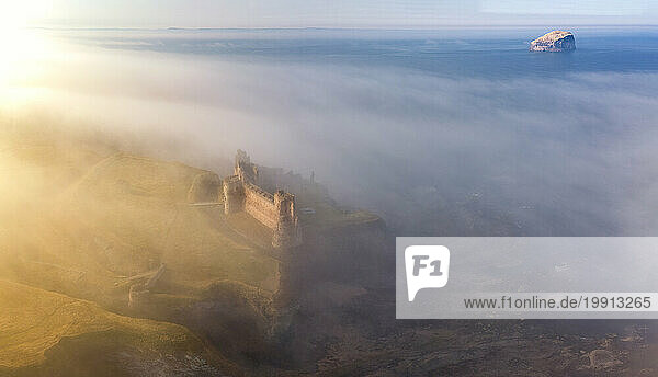 UK  Scotland  North Berwick  Aerial view of Tantallon Castle shrouded in morning fog