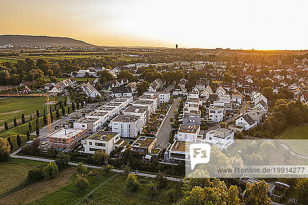Germany  Baden-Wurttemberg  Waiblingen  Aerial view of new modern development area at sunset