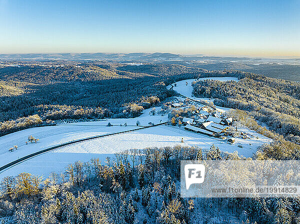 Germany  Baden-Wurttemberg  Aerial view of small snow-covered village in Remstal valley