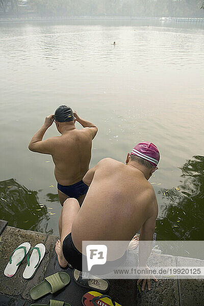 Men swimming in Beijing  China.