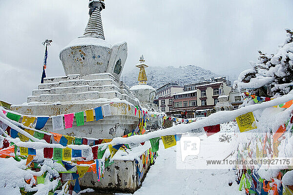Prayer flags in the snow in Yunnan Province  China.