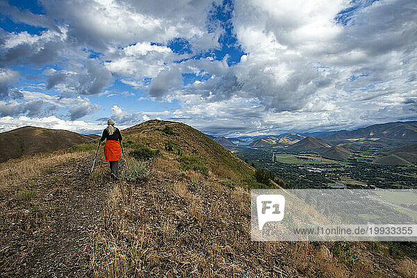 USA  Idaho  Hailey  Senior woman hiking Carbonate Mountain trail