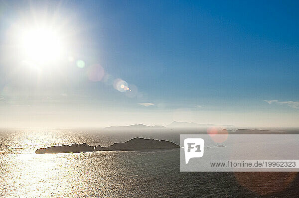 Greece  Ionian Islands  Sun shining over Nisida Kravi island