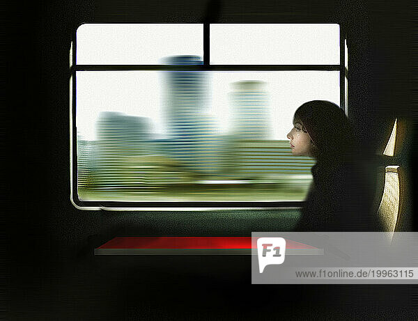 Thoughtful woman traveling in train