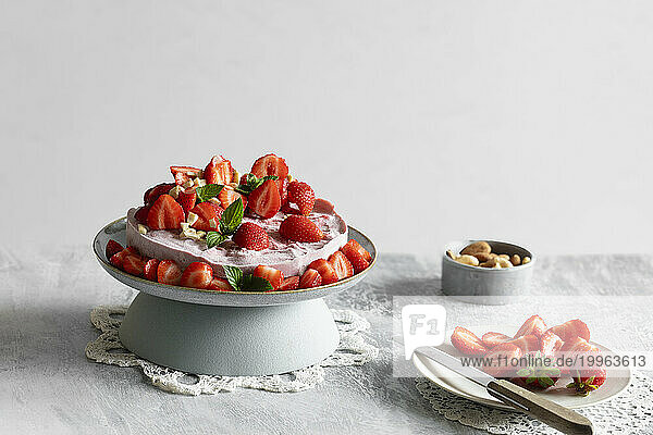 Studio shot of ready-to-eat vegan strawberry tart
