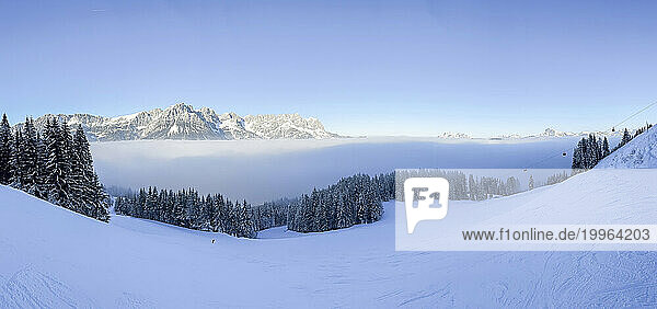 Austria  Panoramic view of thick fog in Kaiser Mountains