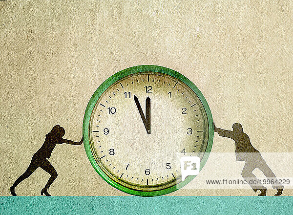 Businessman and businesswoman pushing clock against beige background