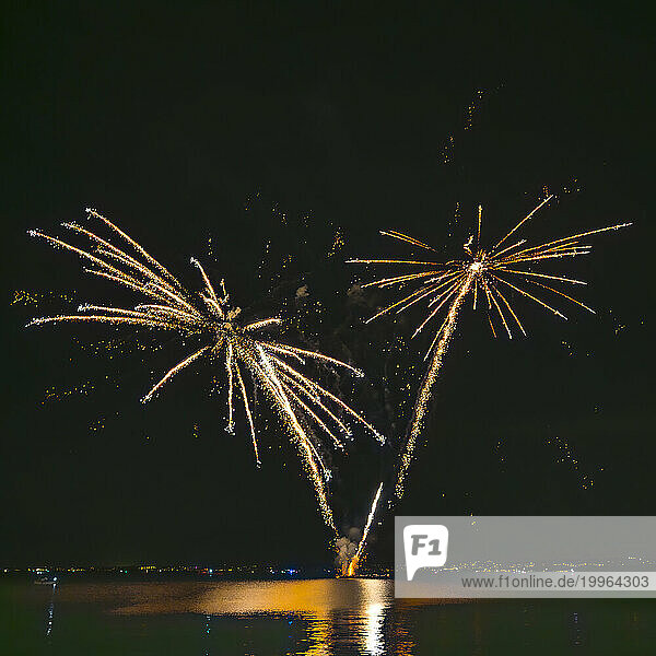 Italy  Veneto  Fireworks exploding over lake Garda at night