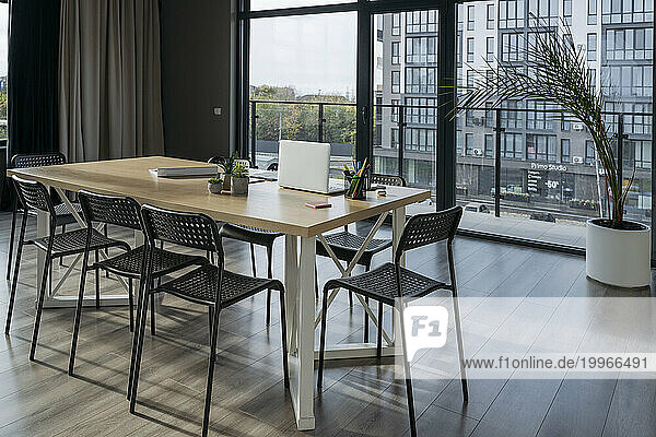 Table and chairs in meeting room at office