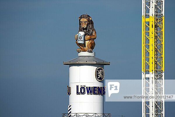 Oktoberfest  afternoon  Lion of the Löwenbräu brewery on the tower of the festival tent  Munich  Bavaria  Germany  Europe