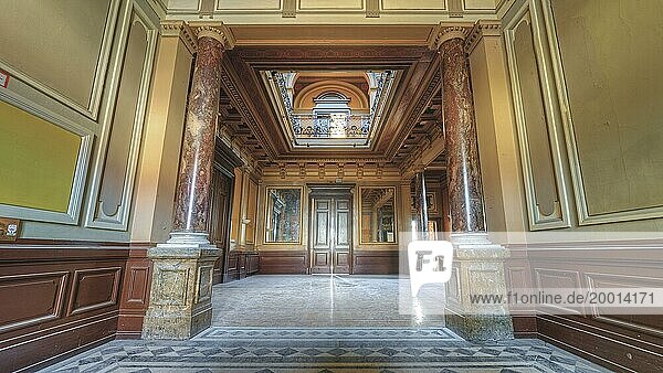 Symmetrical hallway with decorative ceiling and marble floor  flanked by columns  Villa Woodstock  Lost Place  Wuppertal  North Rhine-Westphalia  Germany  Europe