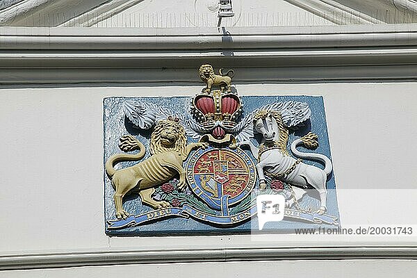 Lion and unicorn royal coat of arms 'Dieu et mon Droit' motto of monarchy seen in Falmouth  Cornwall  England  UK