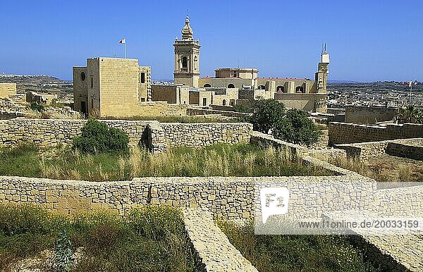Cathedral church tower and ruins inside citadel castle walls Il-Kastell  Victoria Rabat  Gozo  Malta  Europe