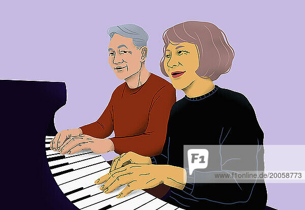Happy senior couple playing piano together