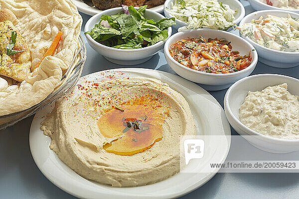 Still life Israeli meze hummus and appetizers
