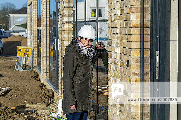 Female Construction manager walking around site
