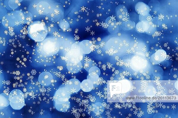 Abstrakter Hintergrund von Kerzenlicht mit snpwflakes für Winter und Weihnachten