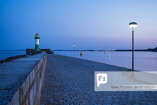 Lighthouse on the pier of Sassnitz on the island of Rügen in the evening