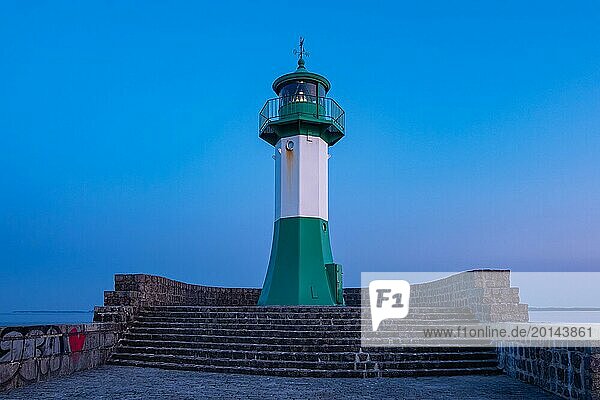 Lighthouse on the pier of Sassnitz on the island of Rügen in the evening
