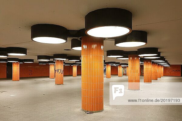 Subway of the Messedamm at the ICC in Berlin. The pedestrian tunnel between the International Congress Centre  ICC and bus station was designed by architect Rainer Gerhard Rümmler. With its 70s design in bright orange  the tunnel has already been used as a backdrop for many Hollywood films  07.8.2018