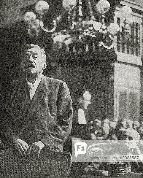 Pierre Laval seen here giving evidence at the trial of Philippe Petain  23 July  1945. Pierre Jean Marie Laval  1883 –1945. French politician and Prime Minister of France. Henri Philippe Benoni Omer Pétain  1856 – 1951  aka Philippe Pétain or Marshal Pétain. General commander of the French Army in World War I and head of the collaborationist regime of Vichy France  from 1940 to 1944. The War in Pictures  Sixth Year.
