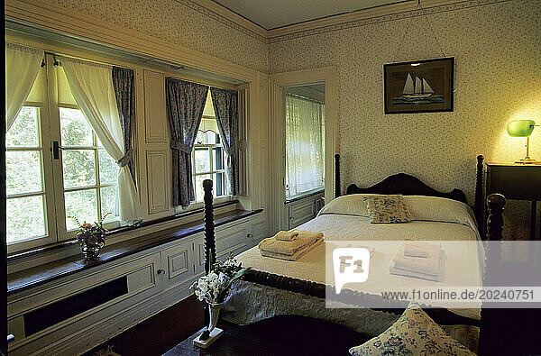 Cozy bedroom awaits travelers at an Inn; Cumberland Island  Sea Islands  Georgia  United States of America