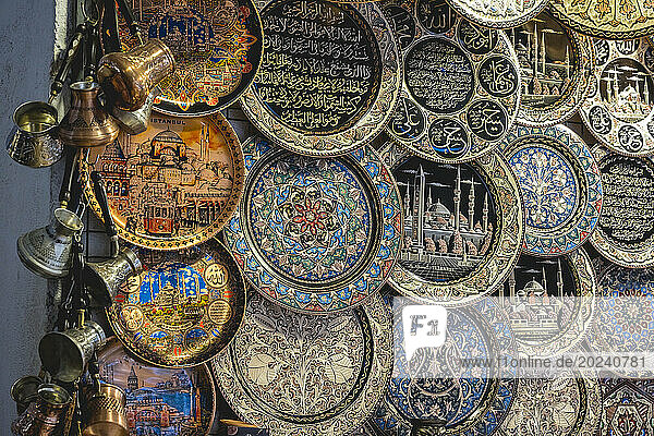 Decorative plates and cups on display for sale at the Grand Bazaar in Istanbul; Istanbul  Turkey