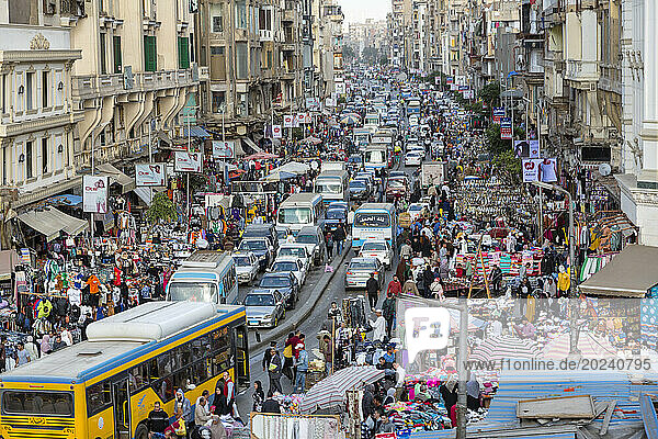 Normal Cairo street activity with congested traffic  people doing commerce and shop venders; Cairo  Egypt