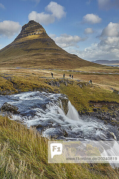 Mount Kirkjufell and Kirkjufellsfoss at Grundarfjordur on Snaefellsnes peninsula along the west coast of Iceland; Grundarfjordur  Iceland