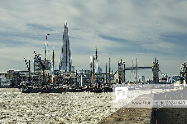 View of Tower Bridge and The Shard from the Thames Path in London  UK; London  England