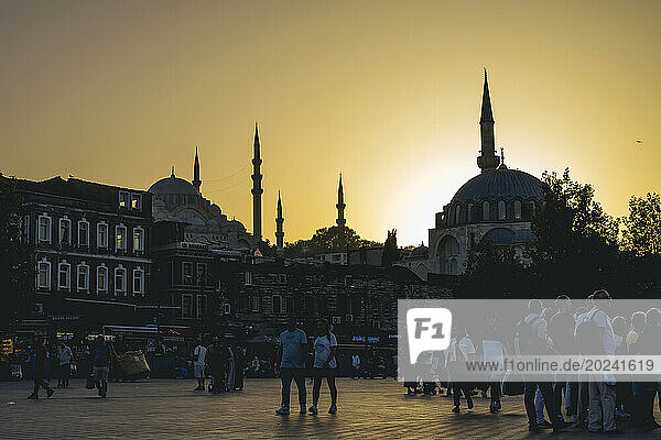 Silhouettes of mosque's minarets and domes at sunset in Istanbul; Istanbul  Turkey