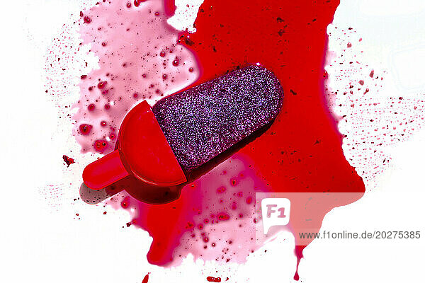 Berry popsicle staining white background