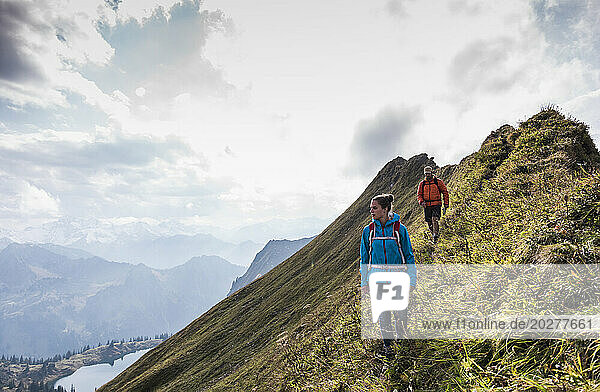 Hikers moving down on mountain at Bavarian Alps in Germany